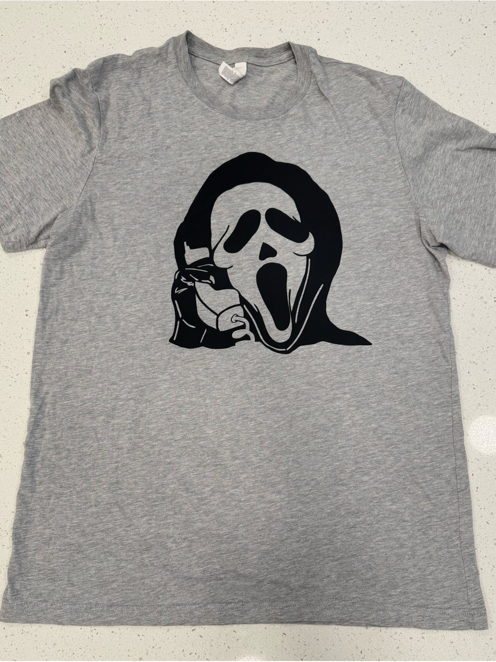 Bold Black Graphic of Ghostface- Scream holding a Telephone/Grunge,‎ Minimalist